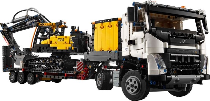 Samochód wyścigowy Volvo FMX i koparka EC230